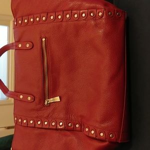 Genuine leather bag, dark pinkish red